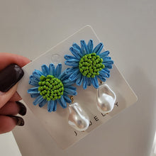 Aretes con perla