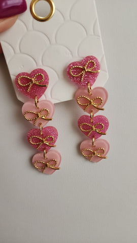 Aretes Cuatro Corazones Rosado