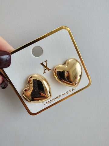 Aretes de corazones dorado