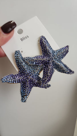 618-15-Aretes Estrellas y Caracol