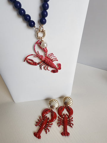 Collar de Esferas  Azules con Langosta  Aretes Rojos