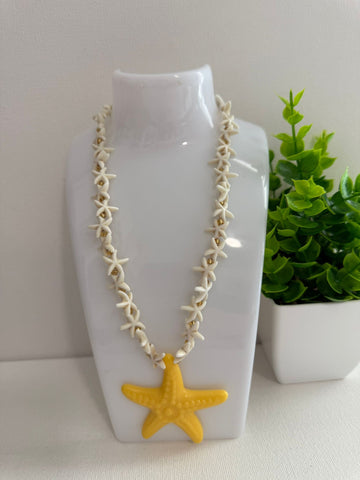Collar estrella amarilla