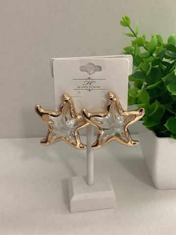 Aretes estrella y Cristal  Color oro