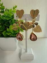 Arete flor con gota Cristal