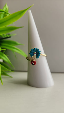 Anillo  Flor Azul y Lady Bug
