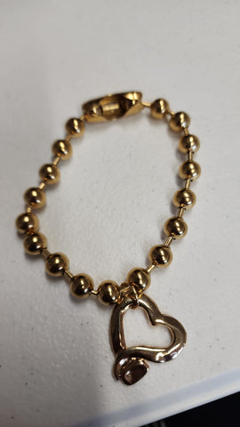 Pulsera de balines clavo corazón