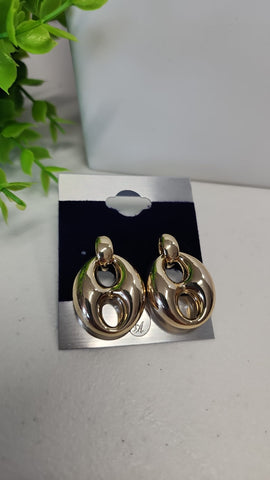 # 001-Aretes GG Oro