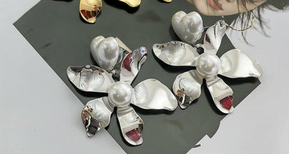 Aretes Flor con Corazón