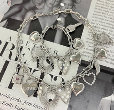 016F- Collar de Charms